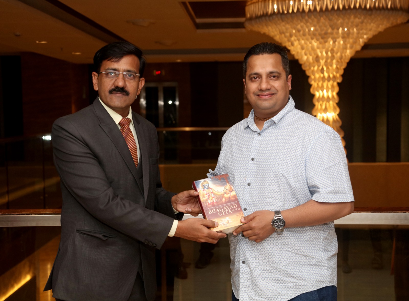 Business professional presenting at a corporate event managed by BMS in Nashik
